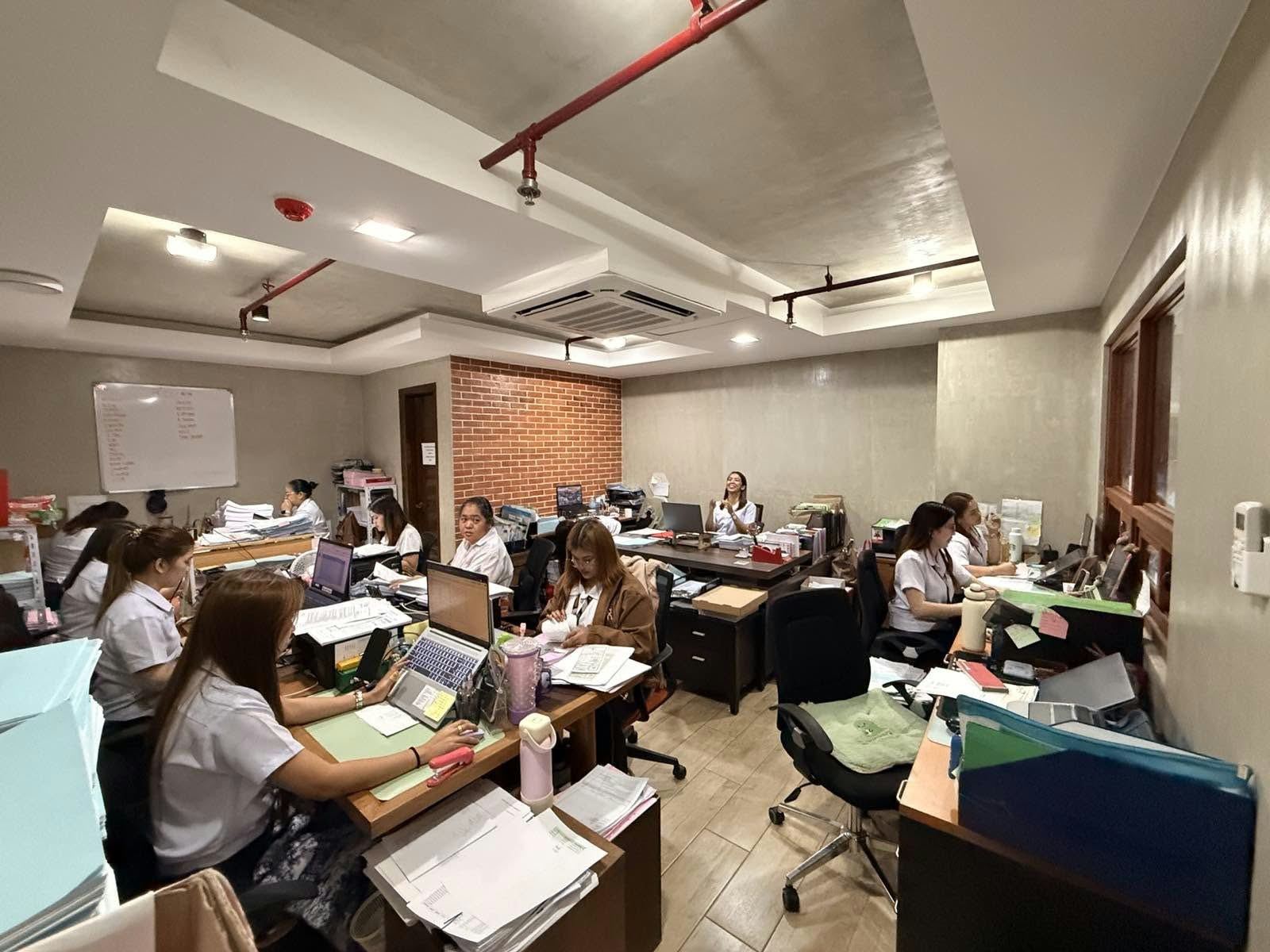 Wide view of the AFL operations floor with staff at their stations